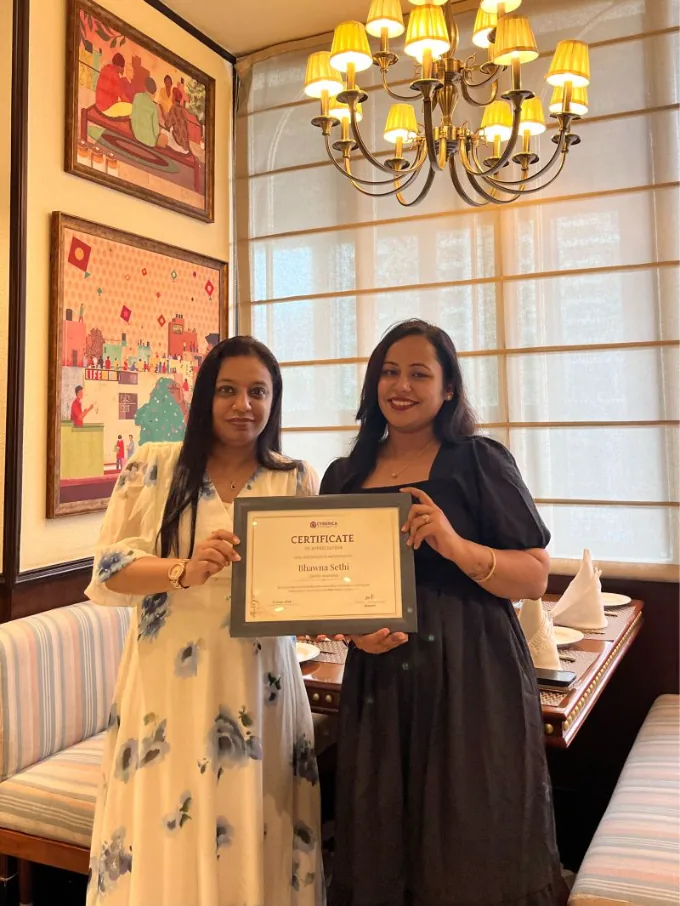 Receiving a certificate of appreciation for CMMI Level 3 quality assurance work